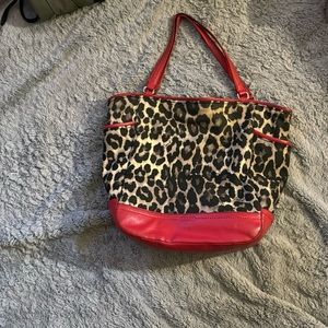 Animal print red coach bag.